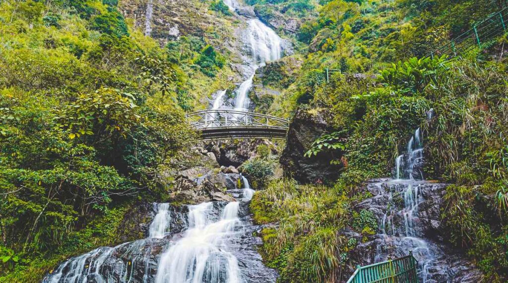 Silver Waterfall in Sapa – a stunning 200m high waterfall surrounded by lush mountains.