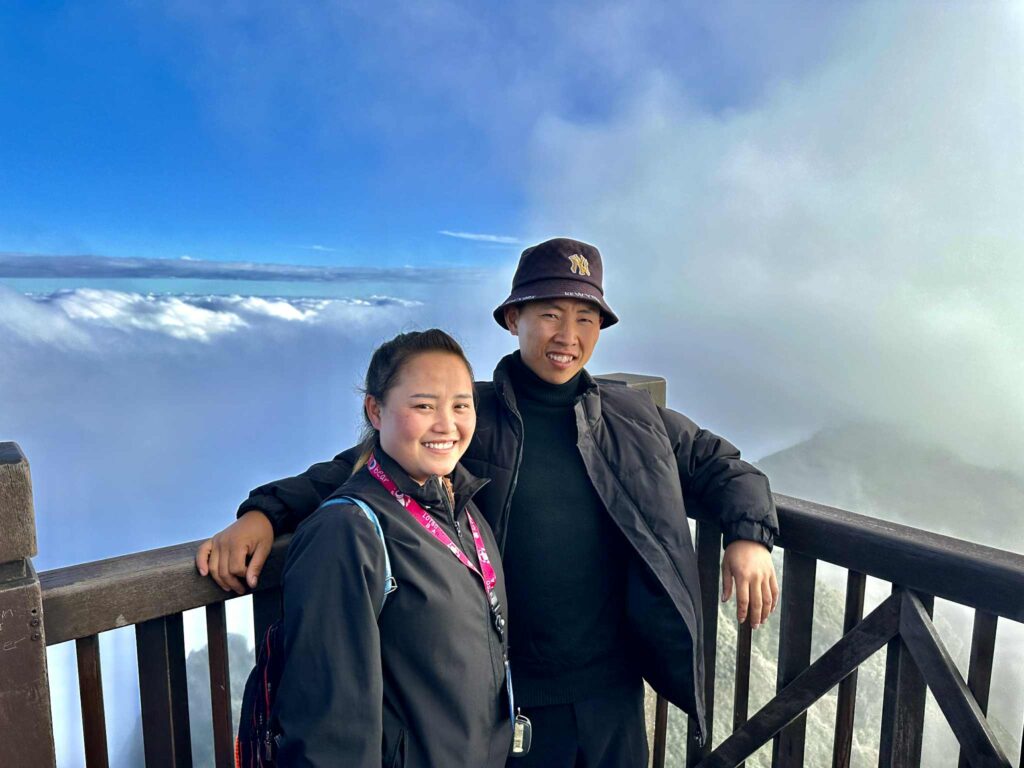 Trekker on the Fansipan mountain trail during the journey to the summit.